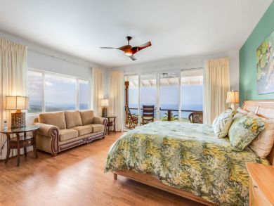 Spacious Bedroom with King Bed & Seating Area